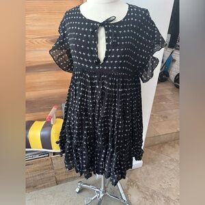 Elegant Black and White Patterned Mini Dress